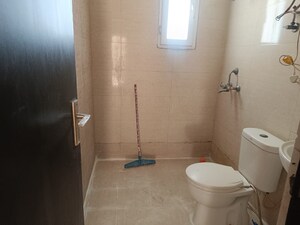 Bathroom in 3 BHK Apartment at Aims Golf City, Sector 75 – for Sale