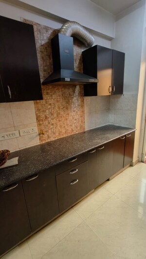 Kitchen in 3 BHK Apartment at Aims Golf City, Sector 75 – for Sale