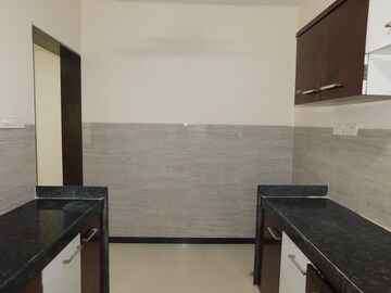 Kitchen in 2 BHK Apartment at Acme Ozone, Manpada – for Rent