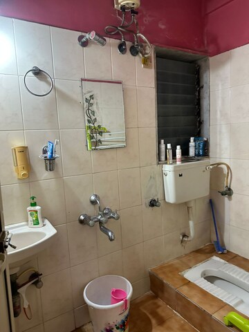 Bathroom in 1 BHK Apartment at HDIL Dheeraj Jamuna, Malad West – for Rent