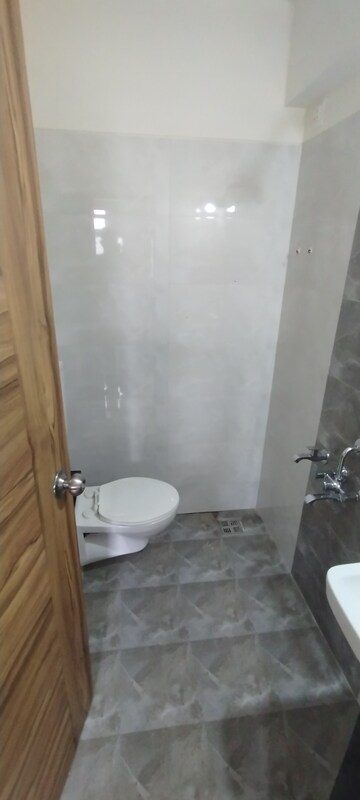 Bathroom in 2 BHK Apartment at KM Horizon Exotica, Haware City – for Rent