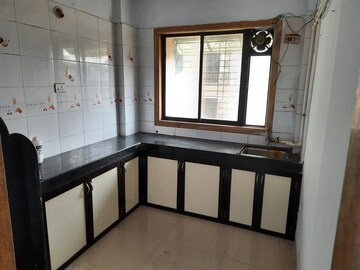 Kitchen in 2 BHK Apartment at Kumbharkhan Pada – for Sale