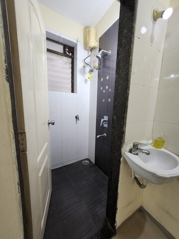 Bathroom in 1 BHK Apartment at Kopar Khairane – for Rent