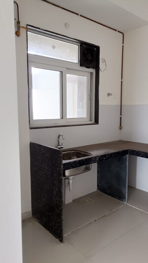 Kitchen in 2 BHK Apartment at Ashar Axis, Majiwada – for Sale