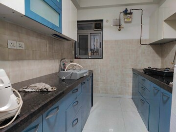 Kitchen in 3 BHK Apartment at Adani Western Heights Sky Apartments, Andheri West – for Rent