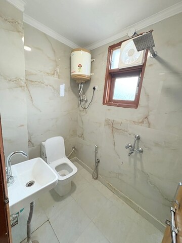 Bathroom in 3 BHK Apartment at Freedom Fighters Enclave – for Rent