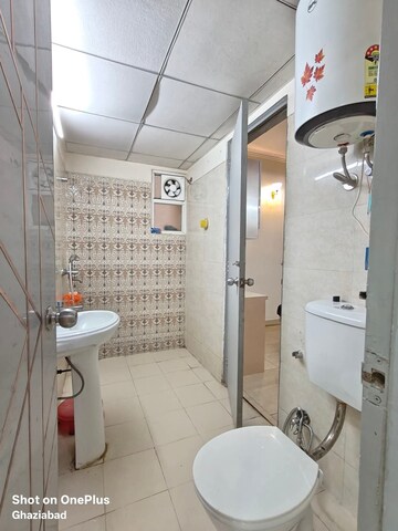 Bathroom in 3 BHK Apartment at Freedom Fighters Enclave – for Rent