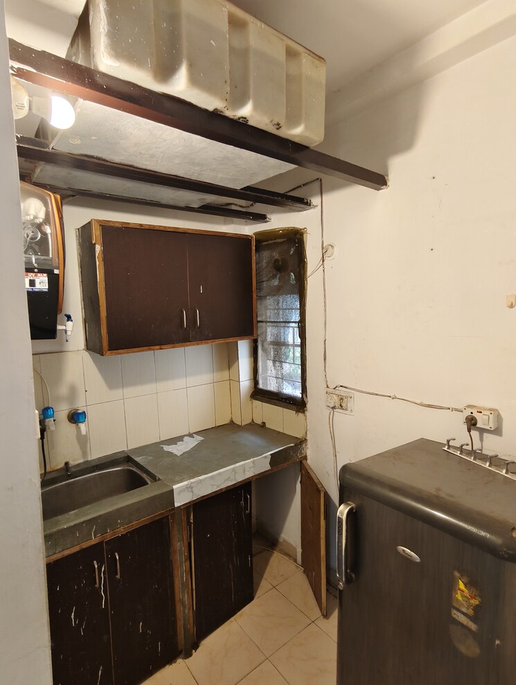 Kitchen, pochanpur colony 1 Bedroom 350 Sq.Ft. Apartment In Pochanpur Colony Delhi 8997032