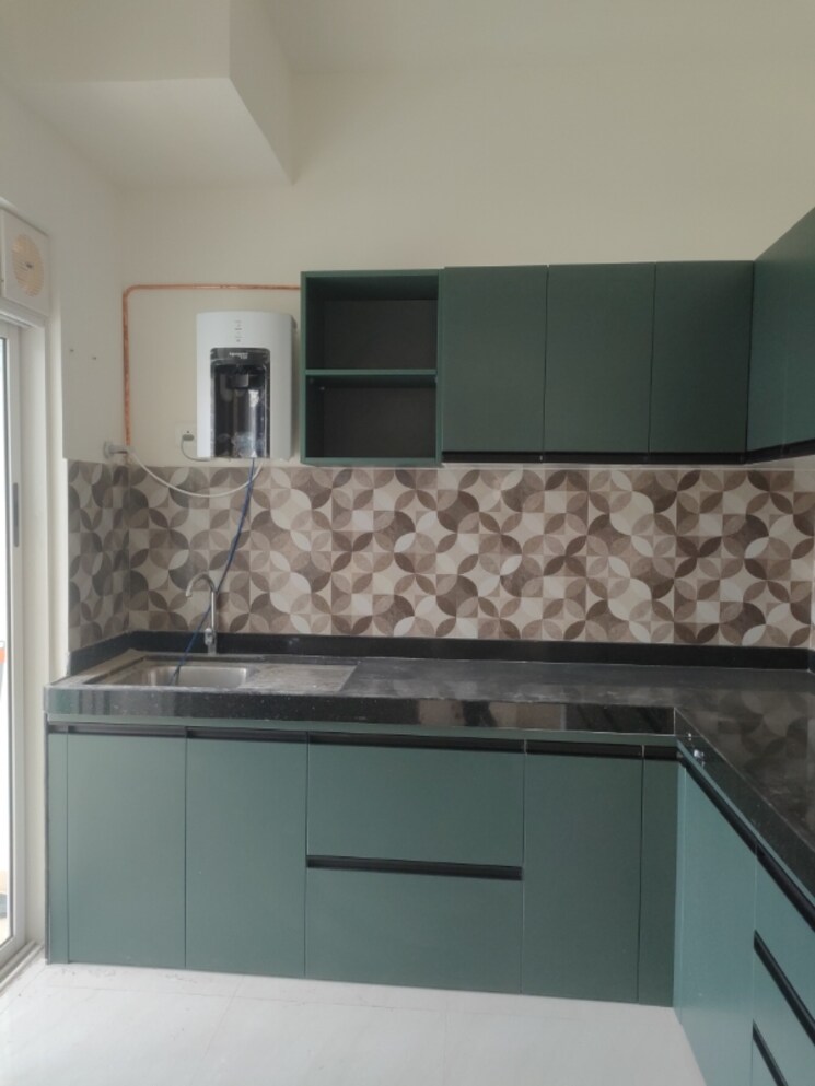 Kitchen, lodha-bella-vita 2 Bedroom 814 Sq.Ft. Apartment In Nibm Road Pune 8997141