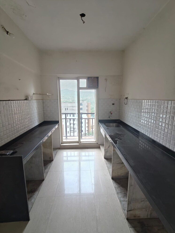 Kitchen, rosa-gardenia 2 Bedroom 625 Sq.Ft. Apartment In Ghodbunder Road Thane 8997157