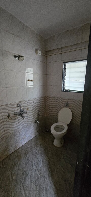 Bathroom in 2 BHK Apartment at Vikram Gayatri Park, Kalwa – for Sale