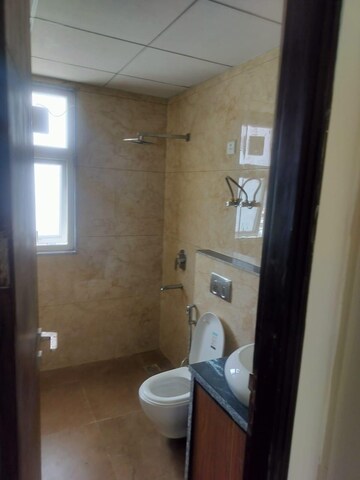 Bathroom in 4 BHK Apartment at Varun C.G.H Society, Sector 52 – for Rent