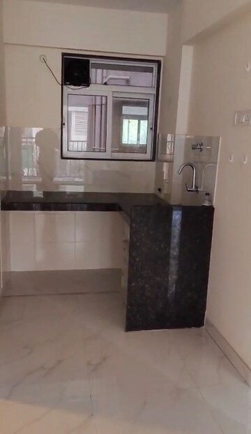 Kitchen in 1 BHK Apartment at Ace Courtyard, Ghodbunder Road – for Rent