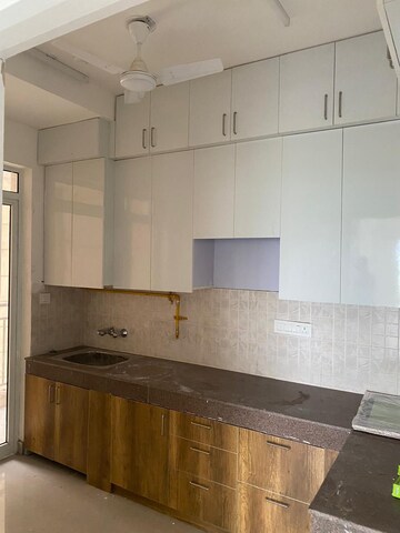 Kitchen in 3 BHK Apartment at ATS Allure, Sector 22d Yamuna Expressway – for Rent