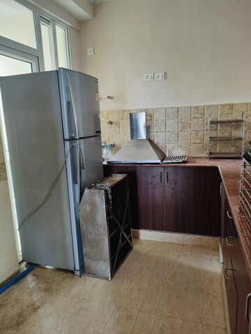 Kitchen in 3 BHK Apartment at Arihant Amber, Sector 1 Greater Noida – for Rent