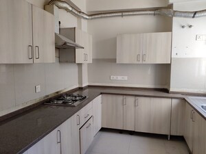 Kitchen in 3 BHK Builder Floor at Emaar MGF Emerald Hills, Sector 65 – for Sale