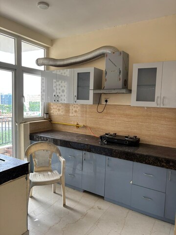Kitchen in 3 BHK Apartment at Omaxe The Palace, Gomti Nagar – for Rent