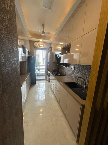 Kitchen in 3 BHK Builder Floor at Ansal API Esencia, Sector 67 – for Rent