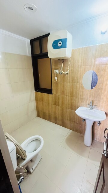 Bathroom in 2 BHK Apartment at Maya Garden City, Nagla Road – for Rent