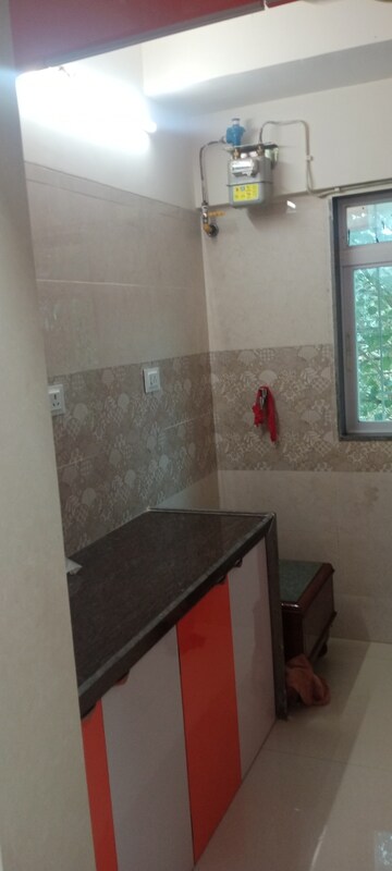 Furnished Amenities in 1 BHK Apartment at Bindra Complex, Andheri East – for Rent