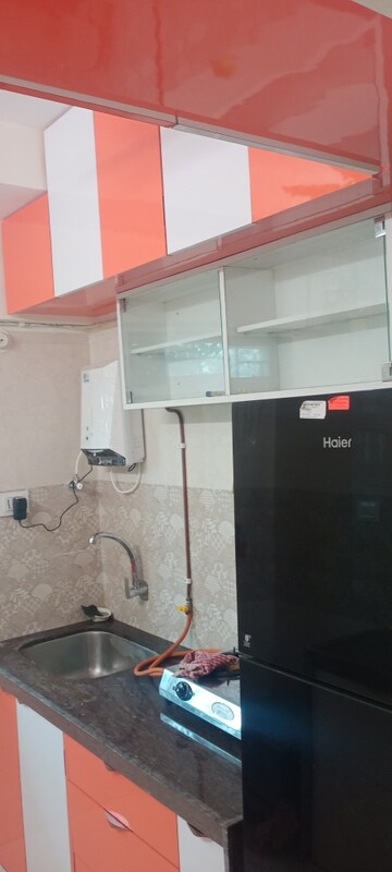 Kitchen in 1 BHK Apartment at Bindra Complex, Andheri East – for Rent
