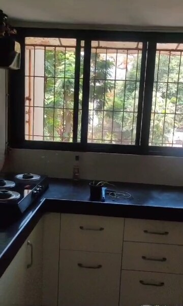 Kitchen in 1 BHK Apartment at Lokpuram CHS, Vasant Vihar – for Rent