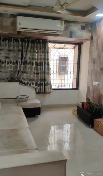 Living Room in 1 BHK Apartment at Lokpuram CHS, Vasant Vihar – for Rent