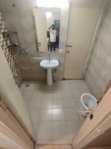 Bathroom in 4 BHK Apartment at Gaur City 1st Avenue, Sector 4 Greater Noida – for Rent