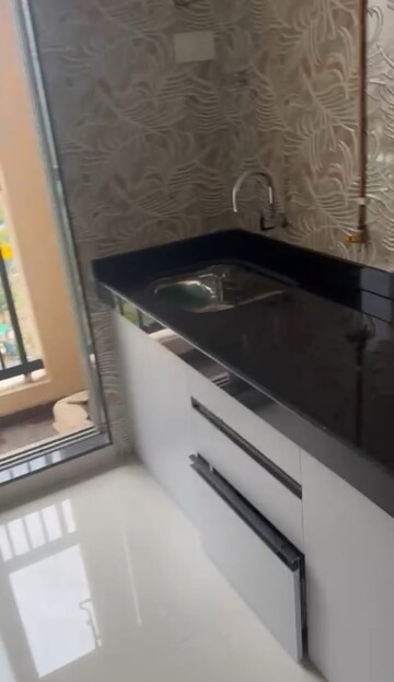 Kitchen in 2 BHK Apartment at Ashar Metro Towers, Vartak Nagar – for Rent