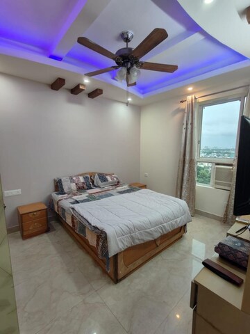 Bedroom in 4 BHK Apartment at Prateek Wisteria, Sector 77 – for Rent