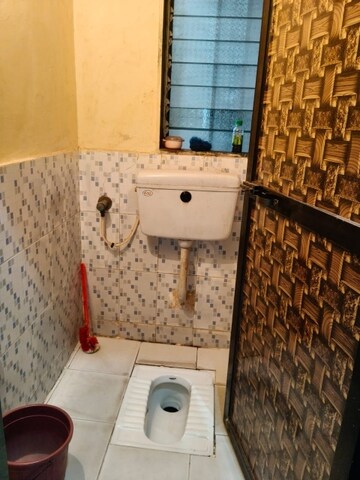 Bathroom in 1 BHK Apartment at Pragati SRA CHS, Santacruz East – for Rent