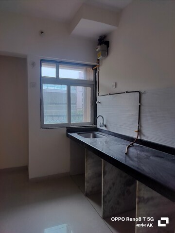 Kitchen in 1 BHK Apartment at Squarefeet Ace Square, Ghodbunder Road – for Rent