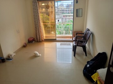 Living Room in 1 BHK Apartment at Kamdhenu Gardenia, Taloja – for Sale