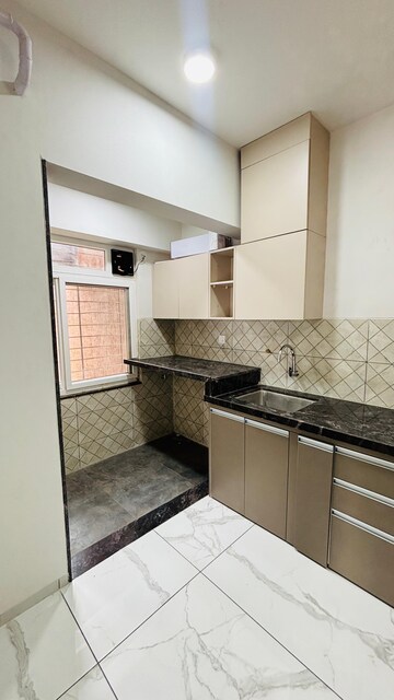 Kitchen in 3 BHK Apartment at Rahul Downtown, Punawale – for Rent