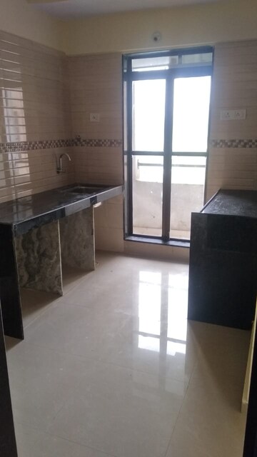 Kitchen in 1 BHK Apartment at Ravi Gaurav Samruddhi, Mira Road East – for Rent