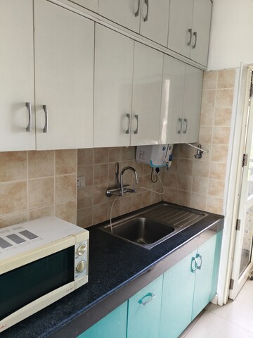 Kitchen in 2 BHK Apartment at AWHO Shanti Vihar, Sector 95 – for Rent