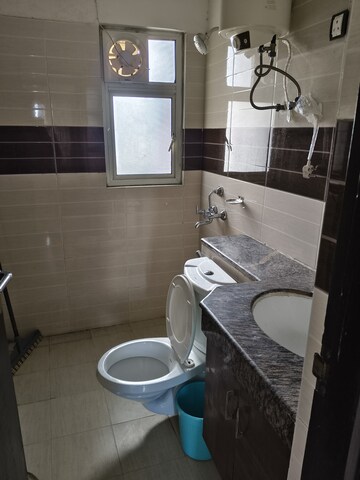 Bathroom in 2 BHK Apartment at AWHO Shanti Vihar, Sector 95 – for Rent