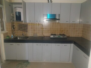 Kitchen in 2 BHK Apartment at Mahagun Mywoods II, Sector 16c Greater Noida – for Rent