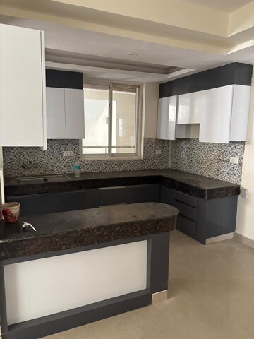 Kitchen in 2 BHK Apartment at Sikka Kaamna Greens, Sector 143a Noida – for Rent