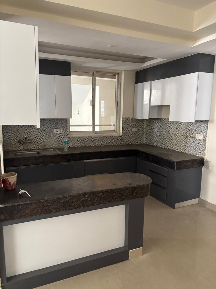 Kitchen, sikka-kaamna-greens 2 Bedroom 702 Sq.Ft. Apartment In Sector 143a Noida Noida 8998945