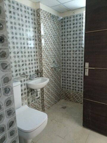 Bathroom in 2 BHK Apartment at Logix Blossom Greens, Sector 143 – for Rent
