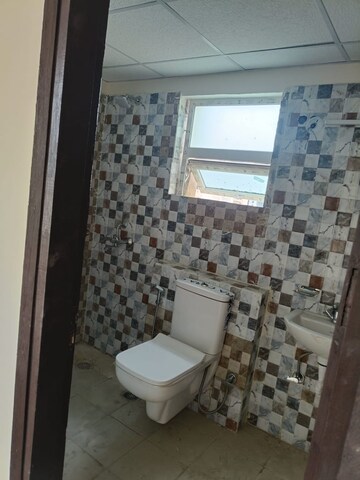 Bathroom in 2 BHK Apartment at Logix Blossom Greens, Sector 143 – for Rent