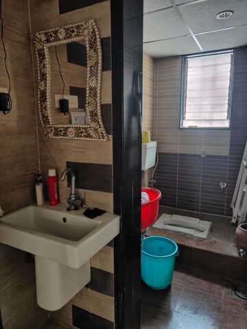 Bathroom in 2 BHK Apartment at GK Rose Woods, Pimple Saudagar – for Rent