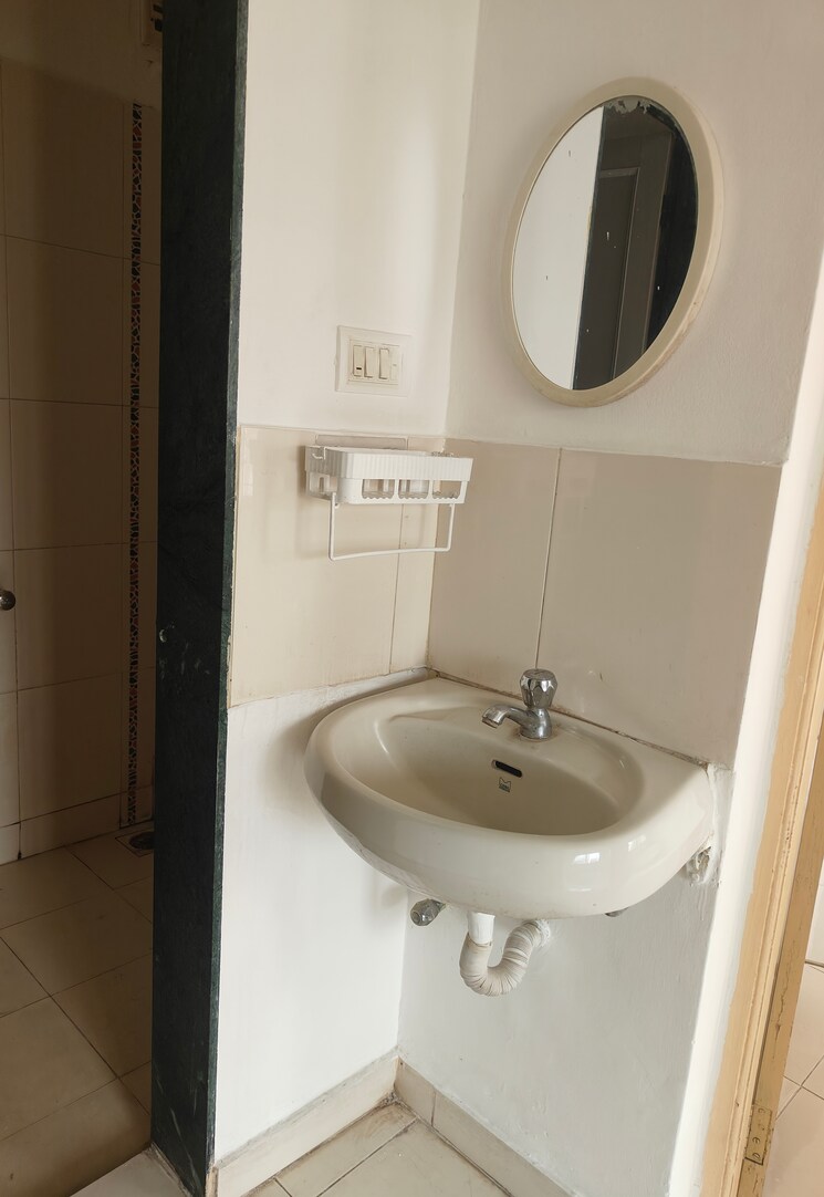 Bathroom, raviraj-planet-millenium 1 Bedroom 700 Sq.Ft. Apartment In Pimple Saudagar Pune 8999017