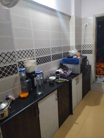 Kitchen in 3 BHK Apartment at Rashmi Drashant, Mira Road – for Rent