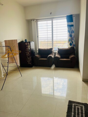 Living Room in 1 BHK Apartment at Vasudha Etasha, Kothrud – for Rent