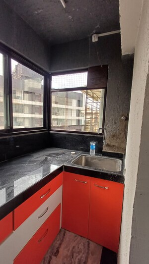 Kitchen in 1 BHK Apartment at Joshi Amar Vaishali CHS, Naupada – for Sale