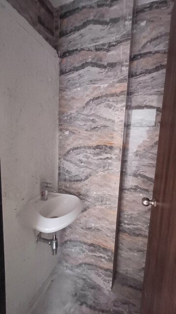 Bathroom in 1 BHK Apartment at Joshi Amar Vaishali CHS, Naupada – for Sale