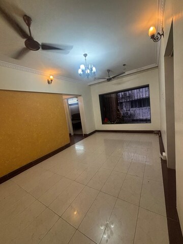 Room in 2 BHK Apartment at Devansh Villa, Bandra West – for Rent