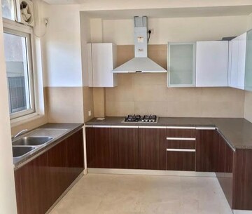 Kitchen in 3 BHK Apartment at Puri Diplomatic Greens Phase I, Sector 111 – for Rent